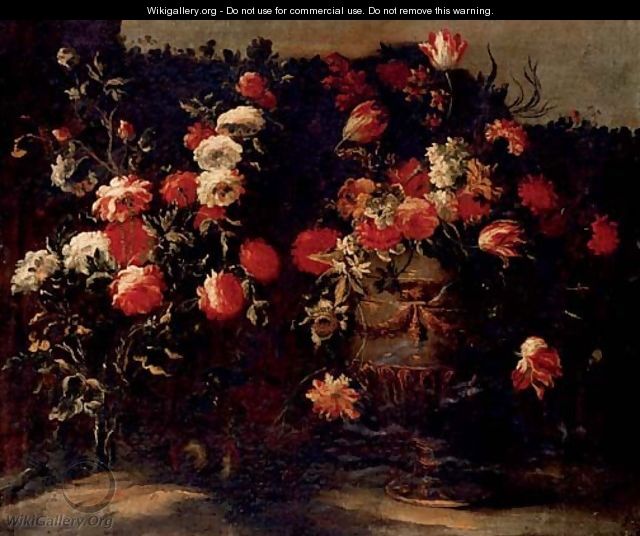 Tulips, roses, daffodils and other flowers in an urn, on a stone - Elisabetta Marchioni Active Rovigo