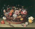 Still life of roses, tulips, bluebells and carnations in a wicker basket with a butterfly - (after) Jan The Elder Brueghel