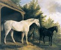 Two Hunters By A Stable With A Landscape Beyond - Richard Barrett Davis