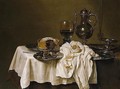 Still Life With A Roemer, A Silver Tazza, A Knife And A Sliced Lemon On A Pewter Plate, A Pie On A Pewter Plate, A Flute, Wine-glass And A Silver Pitcher, Together With A Lemon, All Arranged On A Table - Willem Claesz. Heda