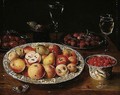 A Still Life Of Apples, Peaches And Pears In A Wan-li Porcelain Dish, Red Grapes In A Wan-li Porcelain Bowl, Plums And Raspberries On Pewter Plates, Figs In A Bowl, Facon-de-venise Wine-glasses, Together With A Butterfly, All Resting On A Wooden Table-top - Osias, the Elder Beert