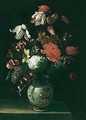 A still life of variegated tulips, narcissi, daffodils and other flowers in a maiolica vase - Neapolitan School