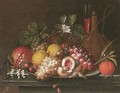Still Life Of Peaches, Lemons, Grapes, Strawberries And Nuts Upon A Pewter Dish, Together With A Pomegranate, An Orange, A Casket Of Wine And A Wine Glass, Upon A Stone Ledge - Jan Pauwel Gillemans The Elder