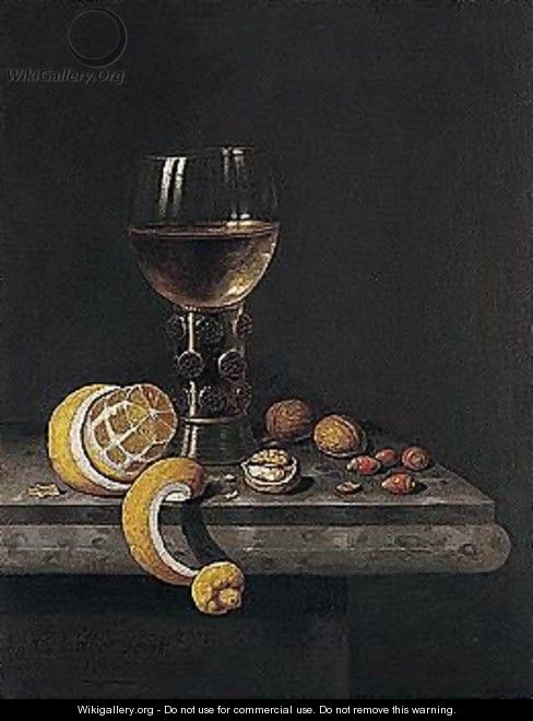 A Still Life Of A Roemer, Peeled Lemon, Walnuts And Hazelnuts Upon A Stone Ledge - Edwart Collier