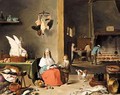 A Kitchen Interior With A Woman Peeling Fruit And Figures Cooking Over A Fire Beyond - (after) David The Younger Teniers