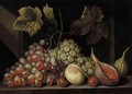 A Still Life With Grapes, Figs, Walnuts And An Apricot, Together On A Stone Ledge - Cornelis De Bryer