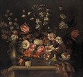A Still Life Of Flowers In A Basket And A Vase On A Ledge - (after) Pieter Hardime