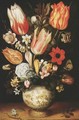 Tulips, Roses, Narcissi, Daffodils, Crocuses, An Iris, A Poppy And Other Flowers In A Gilt-Mounted Porcelain Vase On A Ledge, With A Queen Of Spain Fritillary, A White Ermine And A Magpie Butterfly - Christoffel van den Berghe
