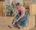 Femme Tirant Son Bas - Camille Pissarro