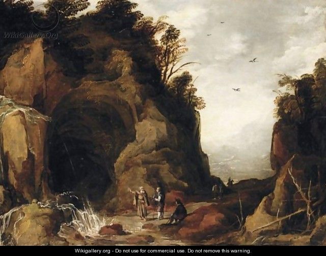 A Mountainous Landscape With Travellers And A Hermit Outside A Cave With A Waterfall - (after) Joos De Momper