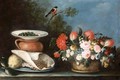 A Still Life Of A Lemon And Seeds, A Terracotta Jar, A Plate Of Olives And A Basket Of Flowers Togther In A Landscape - Italian School