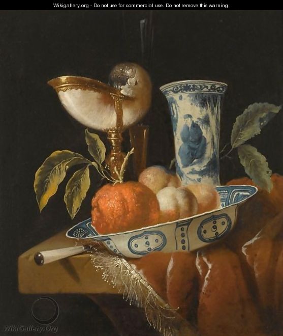 A Still Life With An Orange And Peaches In A Porcelain Wan-Li Bowl, A Nautilus Cup, A Chinese Porcelain Vase - Juriaan Van Streek