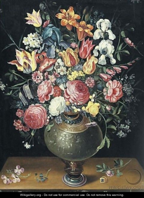 Still Life Of Roses, Tulips, Irises, Lilies And Other Summer Flowers In A Parcel Gilt Vase Beside A Ring Upon A Table - (after) Frans II Francken