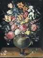 Still Life Of Roses, Tulips, Irises, Lilies And Other Summer Flowers In A Parcel Gilt Vase Beside A Ring Upon A Table - (after) Frans II Francken