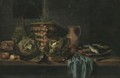 A Still Life With Cabbages, Onions, Apples, A Knife, Wicker Baskets And Earthenware Jugs On A Table - Hubert van Ravesteyn