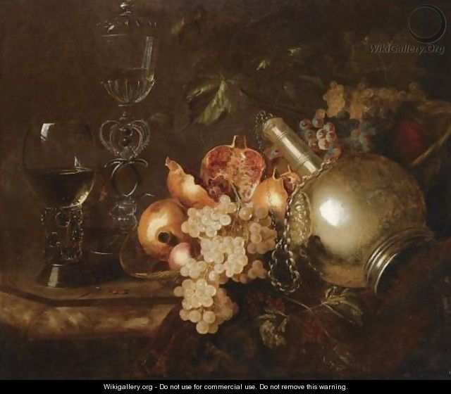 A Still Life Of Pomegranates, Grapes, A Silver Vessel, A Roemer And A Venetian Glass On A Marble Table Draped With A Cloth - Barend or Bernardus van der Meer