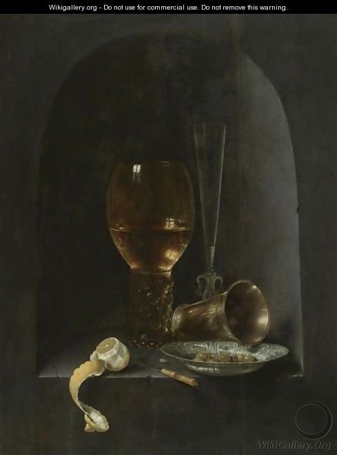 Still Life With A Roemer, A Fluted Wine-Glass, A Silver Goblet, A Blue-And-White Porcelain Bowl Filled With Green Olives - Willem Claesz. Heda
