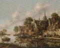 A River Landscape With Figures In Boats Moored Beside A Village - Thomas Heeremans