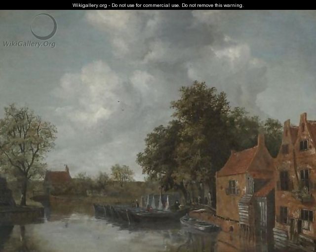 A View On A Canal In A Dutch Village With Barges Moared On The Quay Near Houses - Meindert Hobbema