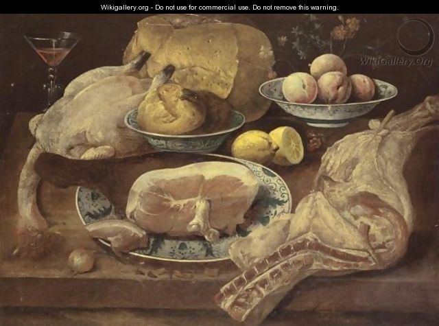 A Still Life With A Leg Of Ham And Other Meats Together With Peaches, Lemons, Buns And A Loaf Of Bread - J.B.V. Beverts