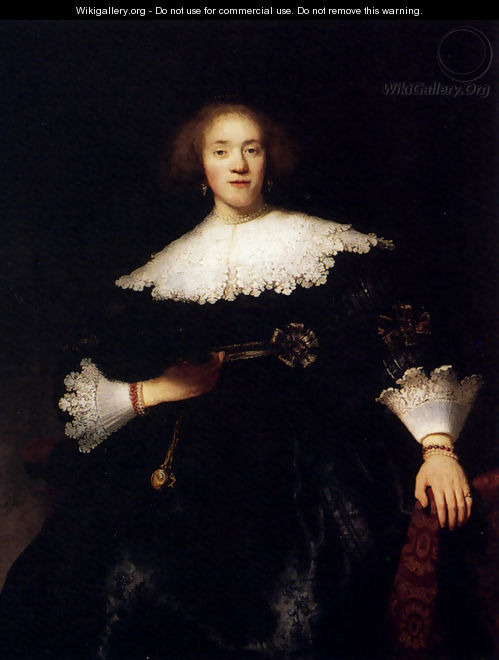 Portrait Of A Young Woman With A Fan - Rembrandt Van Rijn