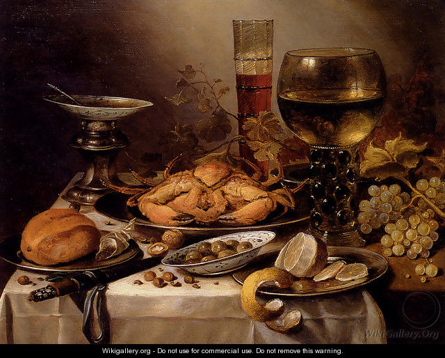 Banquet Still Life With A Crab On A Silver Platter, A Bunch Of Grapes, A Bowl Of Olives, And A Peeled Lemon All Resting On A Draped Table - Pieter Claesz.
