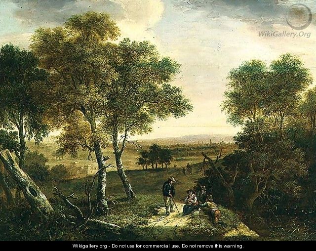 An extensive wooded landscape with peasants by a path, a town beyond - Dionys Verburgh