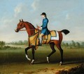 A Bay Racehorse with Jockey Up - James Seymour