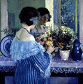 Girl in Blue Arranging Flowers - Frederick Carl Frieseke