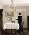 Interior with Lady Carrying Tray - Carl Vilhelm Holsoe