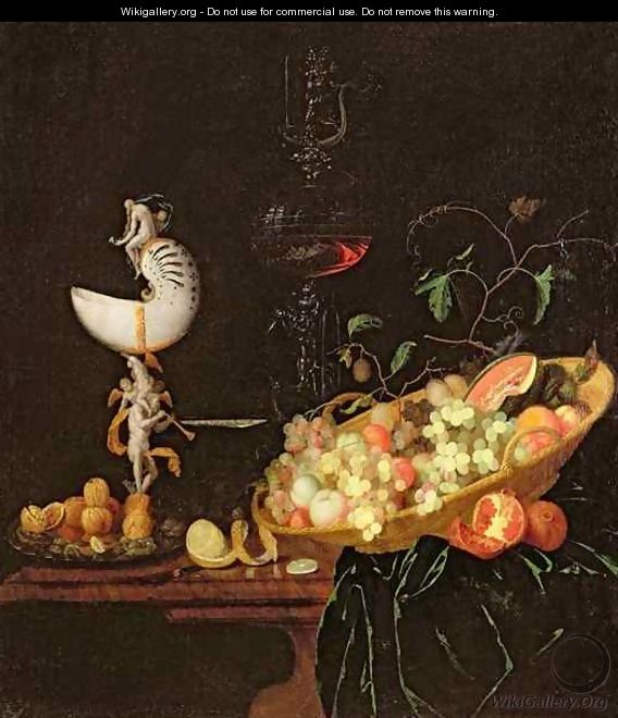 A Still Life of fruit with a nautilus cup on a draped ledge - Georg Hinz