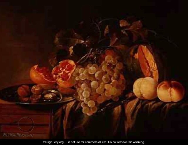 Still life of melon grapes pomegranate walnuts on a pewter plate and peaches - Jasper Geerards