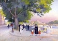 Promenade on the banks of the Seine in Paris - Jules Ernest Renoux