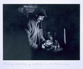Ponting developing a plate in the dark room, from Scotts Last Expedition - Herbert Ponting
