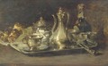 A silver tete aA  tete, a bottle and brioches on a table - Guillaume-Romain Fouace