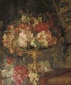 Rhodondendrons in a brass vase on a ledge - German School