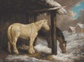 Ponies by a byre in a winter landscape - George Morland