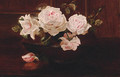 Roses in a bowl on a table - Henrietta de Longchamp