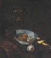 Fruit in a blue and white porcelain bowl - (after) Willem Kalf