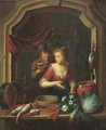 A woman cleaning vegetables and fish by a window, a man holding a birdcage nearby - (after) Willem Van Mieris