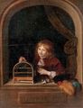 A boy in a feigned niche holding a cage with a song bird - (after) Willem Van Mieris