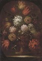Chrysanthemums, tulips and other flowers in an urn, in a feigned oval - (follower of) Nuzzi, Mario