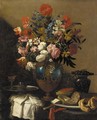 Roses, tulips, daffodils, morning glory, peonies and other flowers in an ormolu mounted vase, with olives, bread, meat, cheese and wine on a ledge - (follower of) Nuzzi, Mario