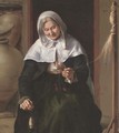 An old woman spinning wool in an interior - (after) Louis And Matthew Le Nain