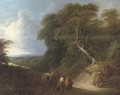 A wooded landscape with travellers on a track - (after) Lodewijk De Vadder