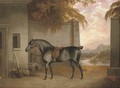 A saddled black horse in a yard with a river landscape beyond - G. Jackson