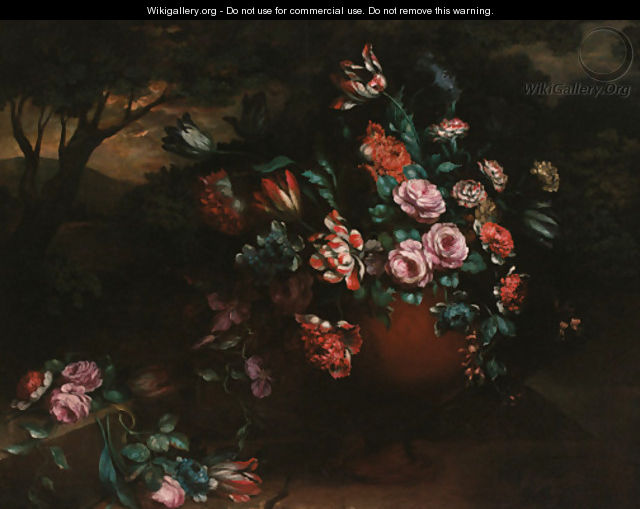 Parrot tulips, roses and carnations in an urn before a wooded landscape - French School