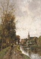 Houses along a river - Fredericus Jacobus Van Rossum Chattel