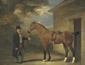 A gentleman with a bay hunter outside a stable - John Ferneley, Snr.