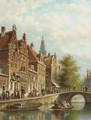 An Amsterdam canal with the Westertoren beyond - Johannes Franciscus Spohler